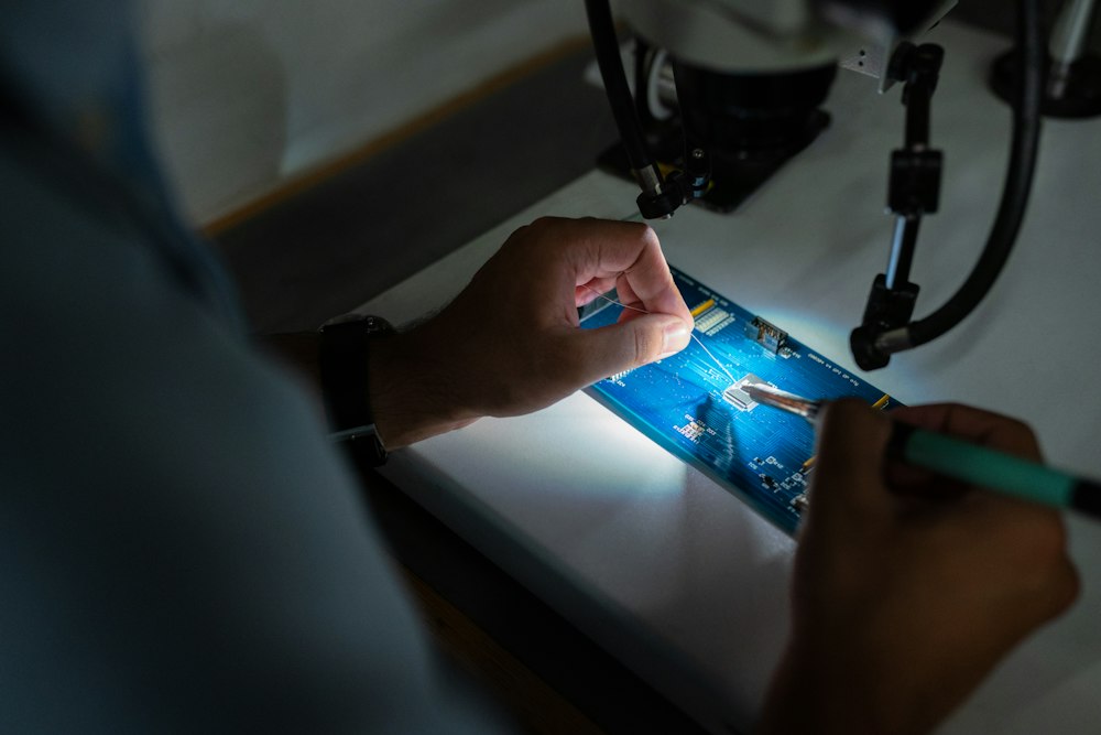 Technician working with computer hardware